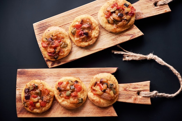 Freshly baked mini pizzas сocas