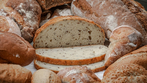 Freshly baked natural bread is on the kitchen table.