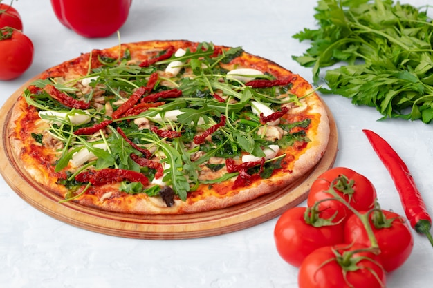 Freshly baked pizza on table close up