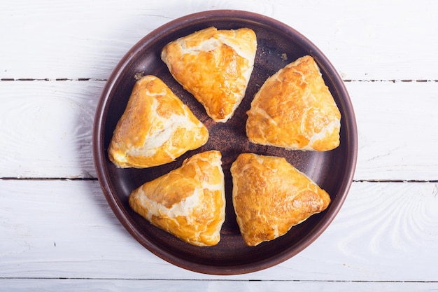 Freshly baked puff pastry samosa Asian food