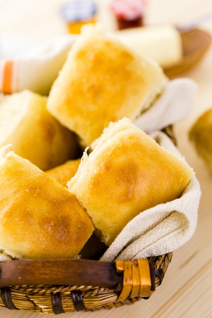 Freshly baked sourdough dinner rolls on the table