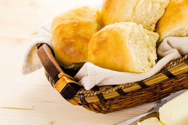 Freshly baked sourdough dinner rolls on the table.