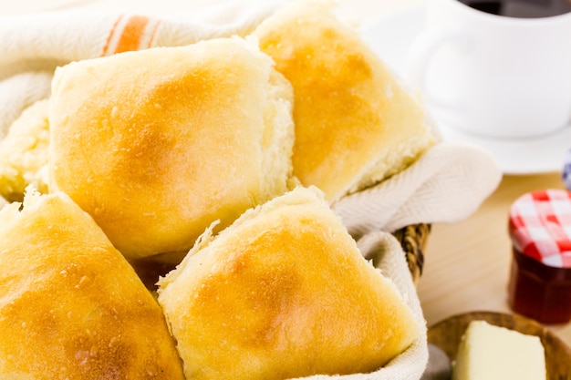 Freshly baked sourdough dinner rolls on the table.