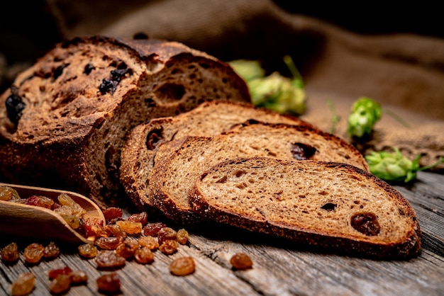 Freshly baked traditional bread on wooden table. Healthy food