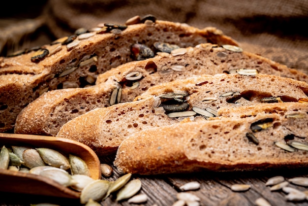 Freshly baked traditional bread on wooden table