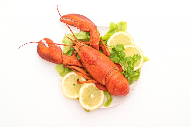 freshly boiled lobster with vegetable and lemon