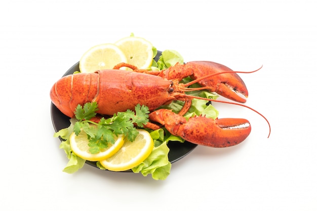 freshly boiled lobster with vegetable and lemon