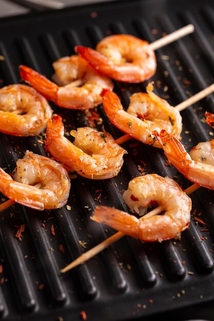 Freshly cooked shrimps on a grill