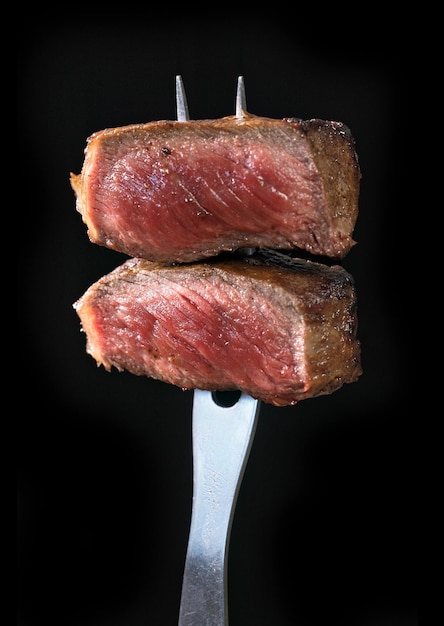 Freshly grilled pieces of beef steak