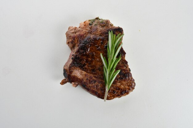 freshly grilled steak isolated on white background