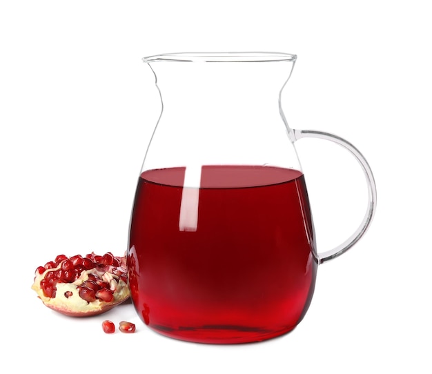 Freshly made pomegranate juice in jug on white background