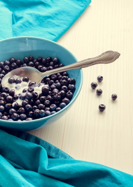 Freshly picked blueberries with cream