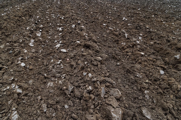 Freshly plowed soil close full frame background with edgetoedge sharpness