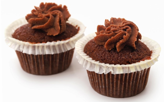 Freshly prepared homemade muffin over white background