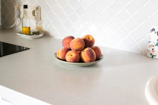 Freshly red peaches on white background