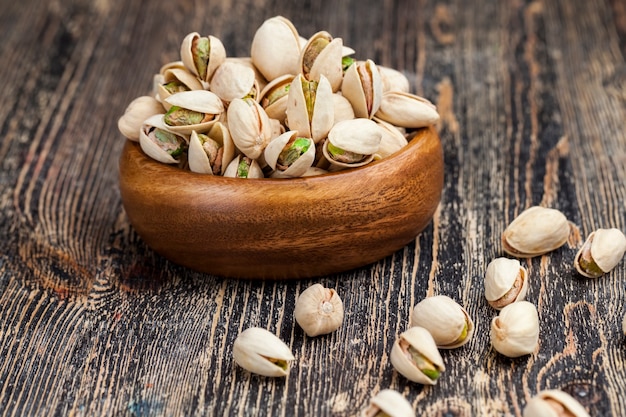 Freshly roasted pistachio nuts in salt, toasted crispy pistachios sprinkled with salt