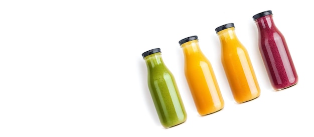 Freshly squeezed juice in bottles on white background banner Generative AI