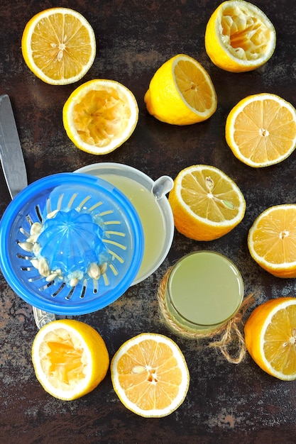 Freshly squeezed lemon juice. Lemon Fresh Lemons Lemon halves. The concept of weight loss with lemon juice.