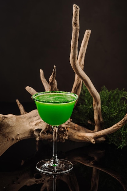 Freshy green cocktail on the black background