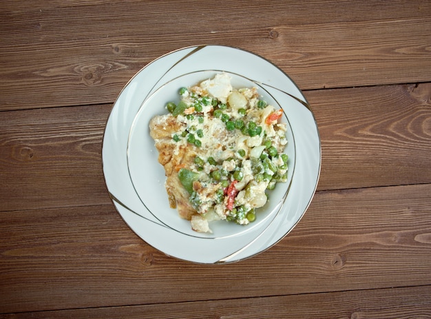 Fricassee of white fish. traditionally a white sauce.