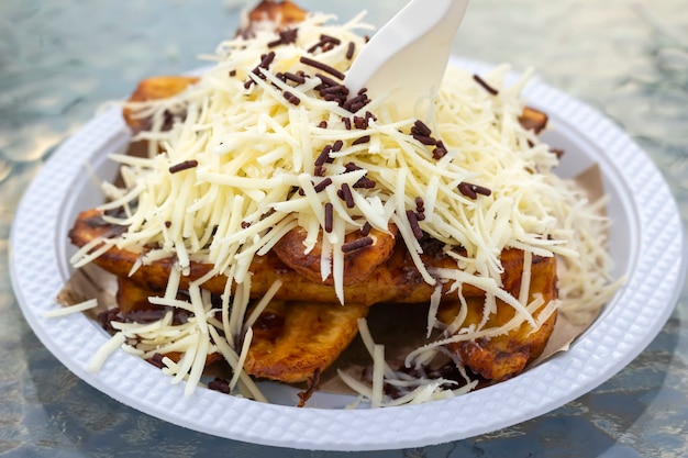 Fried Banana With Chocolate And Cheese on the table