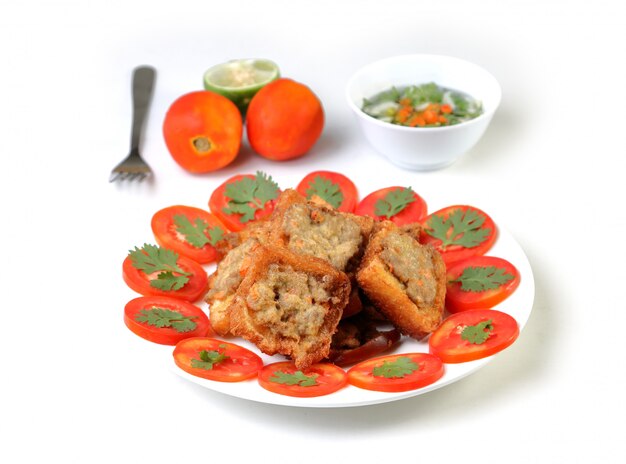 Fried bread with minced pork spread on white 