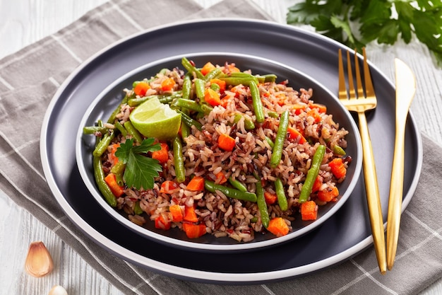 Fried brown rice with green beans and carrot