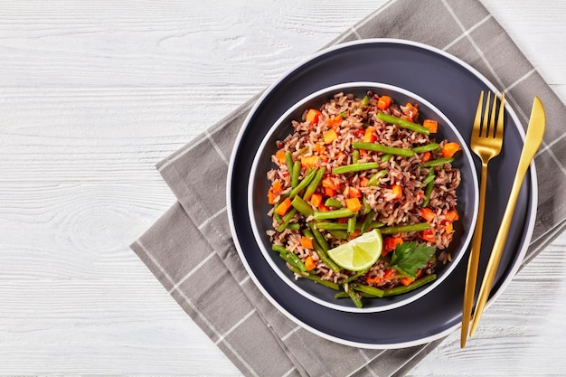 Fried brown rice with green beans and carrot