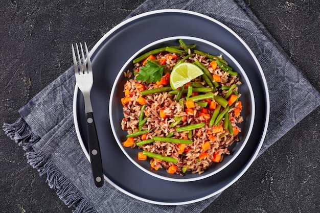 Fried brown rice with green beans and carrot