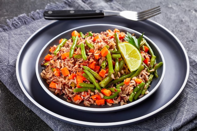 Fried brown rice with green beans and carrot