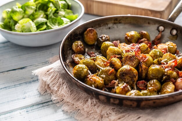 Fried brussels sprout with roasted bacon and parmesan cheese.
