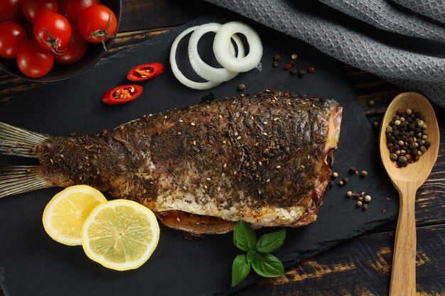 Fried carp fish on the table