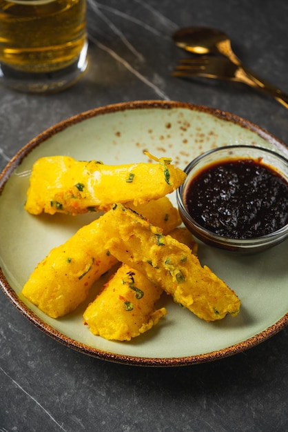 Fried casava mendoan (Indonesia  singkong goreng mendoan) is Indonesian traditional food.