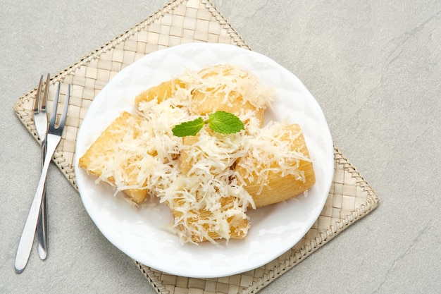 Fried cassava with cheese or singkong goreng keju Indonesian traditional food