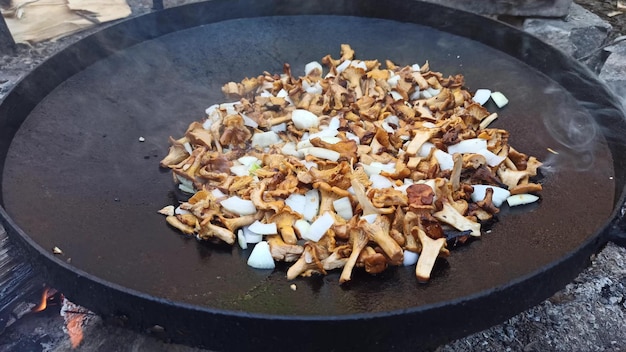 Fried chanterelles Cooking delicious dish of mushrooms Fried chanterelles