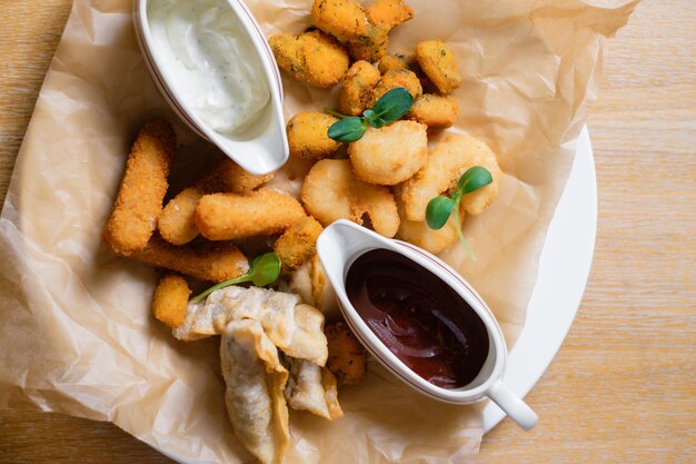 Fried cheese chicken nuggets and meat Restaurant menu concept