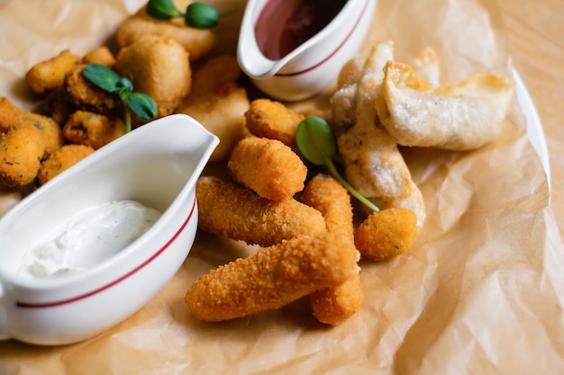 Fried cheese chicken nuggets and meat restaurant menu
concept
