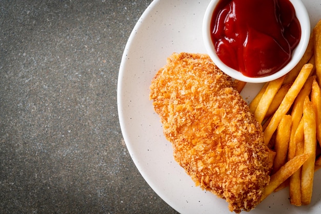 Fried chicken breast fillet steak with french fries