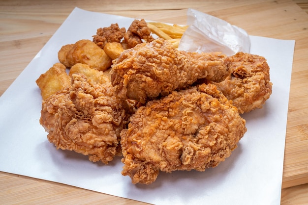 Fried chicken crispy chicken on wooden background