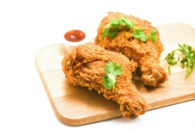 Fried chicken crispy on plate wooden board with ketchup