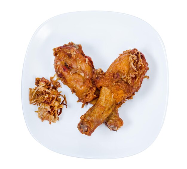 Fried Chicken Drumstick on white dishisolated on white backgroundclipping path