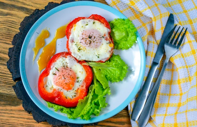 Fried chicken eggs in bell pepper