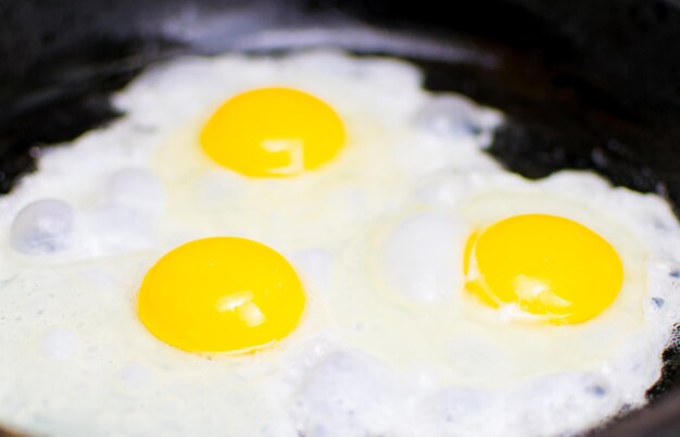 Fried chicken eggs in a frying pan