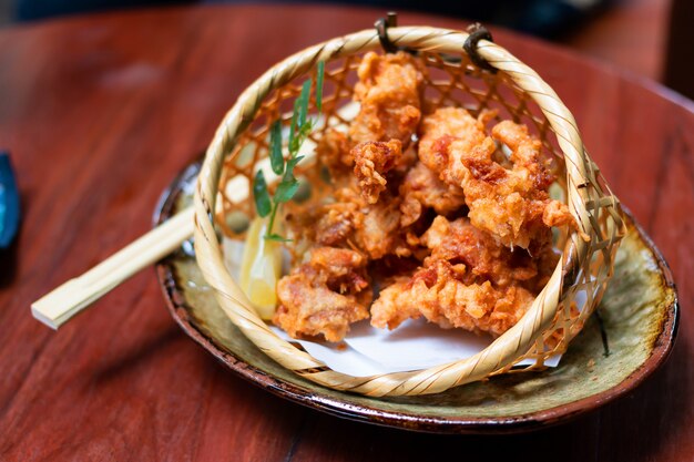 Fried chicken is Herbal mixtures In the basket made of bamboo