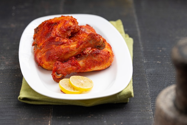 Fried chicken leg  or drum stick fry spicy Indian chicken fry with black  background