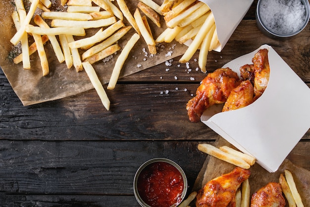 Fried chicken legs with french fries