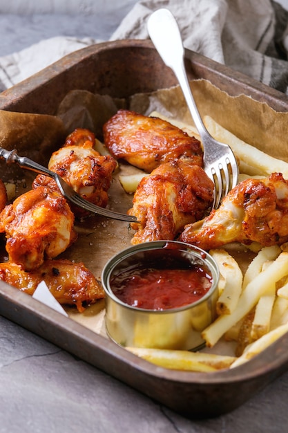 Fried chicken legs with french fries