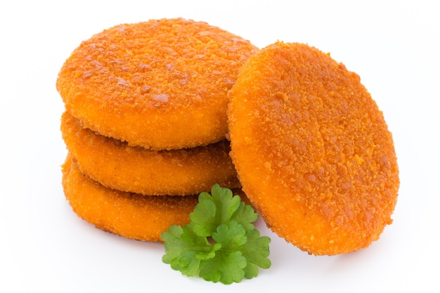 Fried chicken nuggets isolated on white.