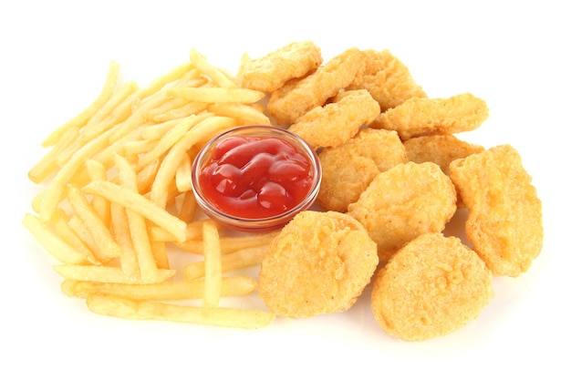 Fried chicken nuggets with french fries and sauce isolated on white