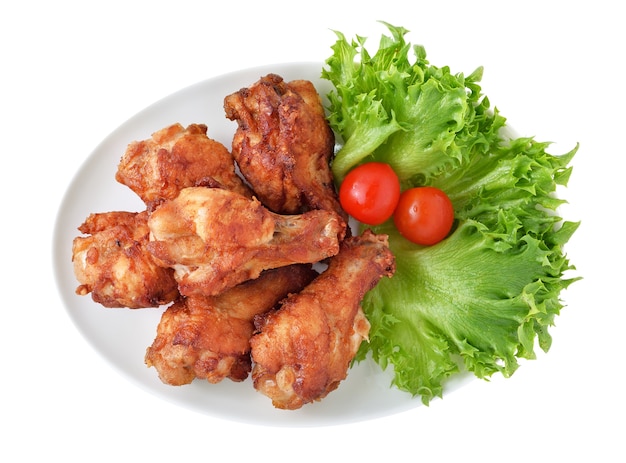 Fried Chicken and salad on white background